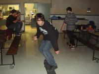 Josh skating in the fellowship hall